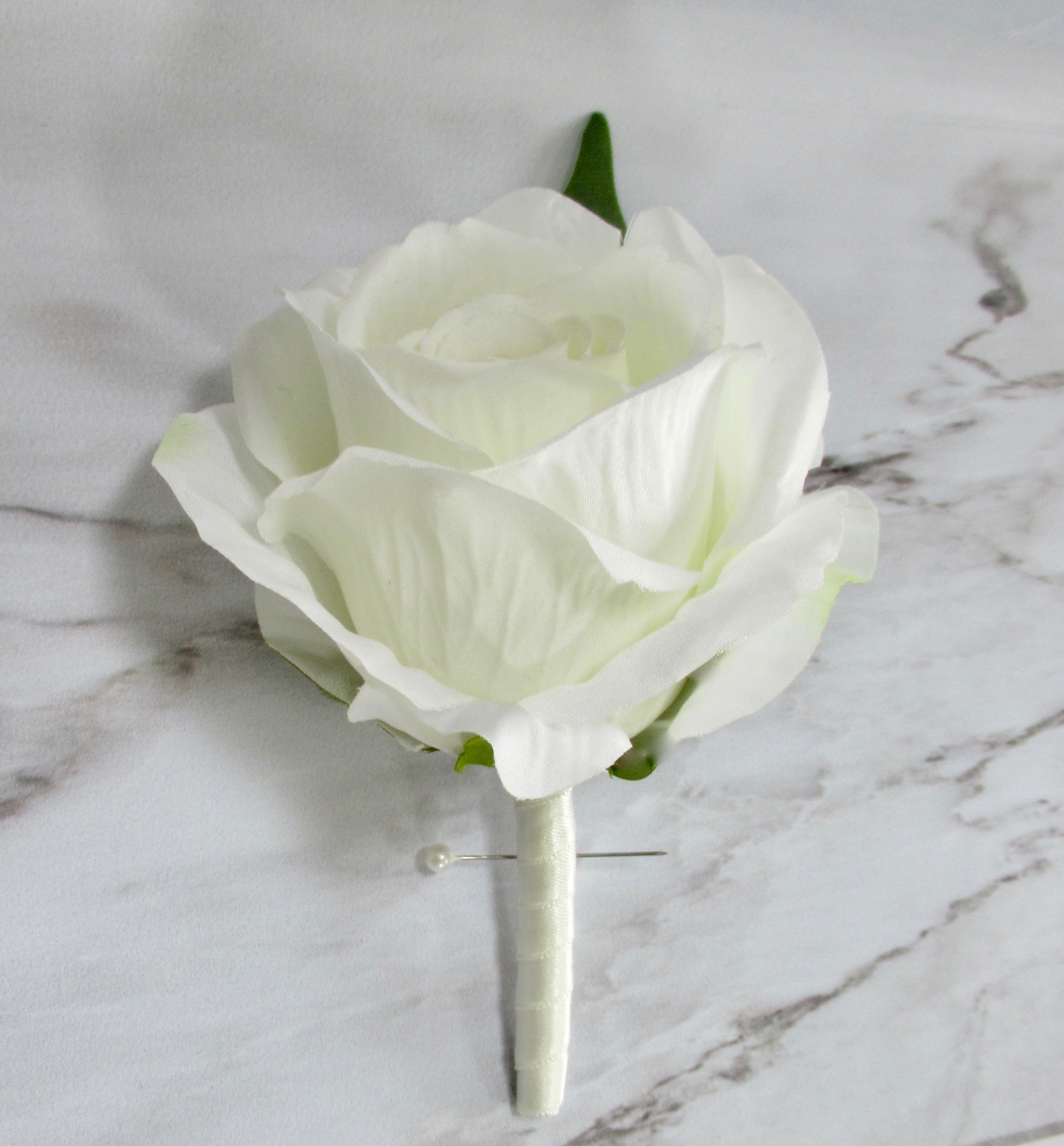 Ivory silk rose buttonhole for weddings